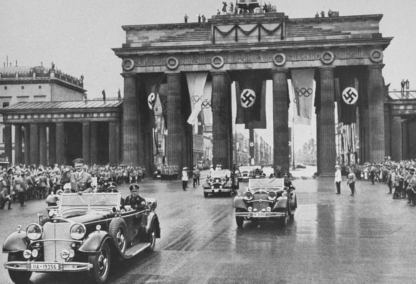Adolf Hitler crosses Berlin in his car on his way to the Olympic stadium for the opening of the 1936 Olympic games 